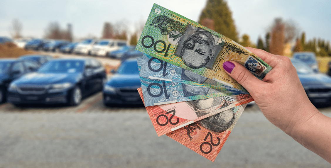 close-up-female-hand-with-australian-dollar-banknotes-1-1